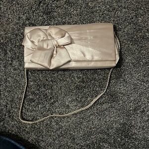 Elegant Cream Clutch with Bow Accent